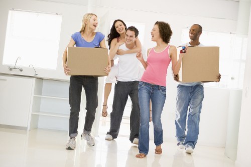 Moving van and boxes prepared for house removals in Ham