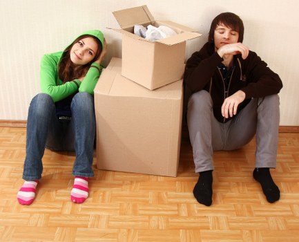 Moving day preparation with packed boxes ready for house removalists in Ham