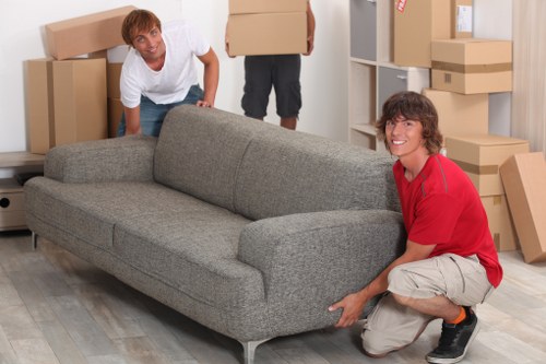 Careful loading of fragile household items in a Ham removals process